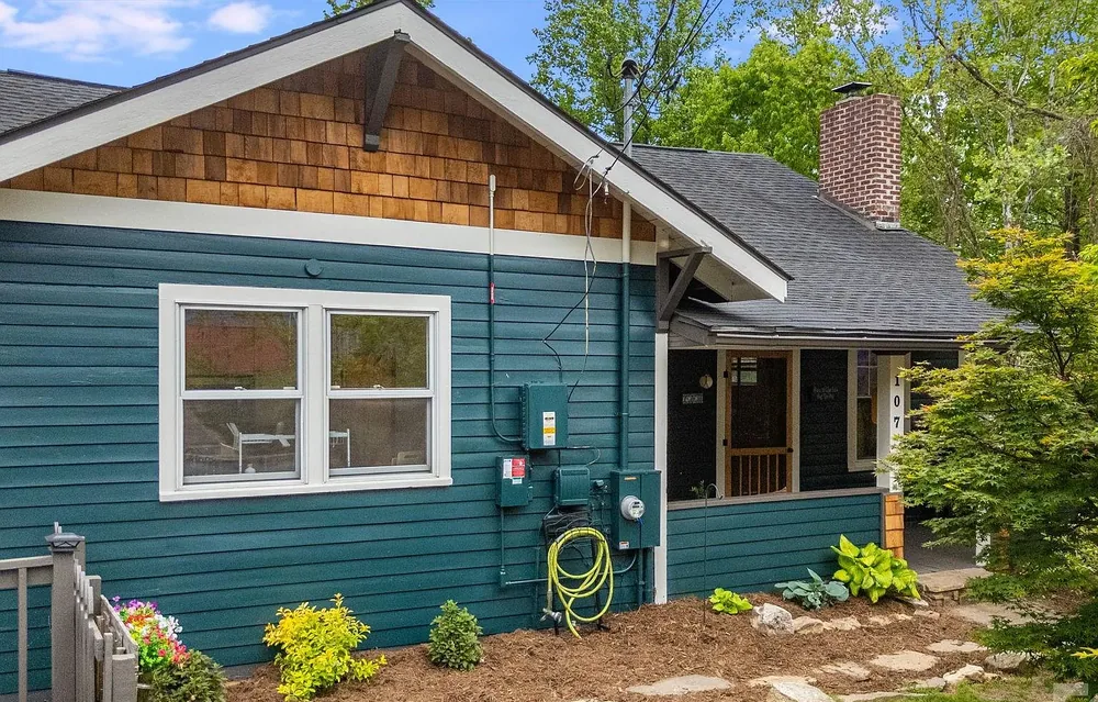Teal exterior siding repaint, craftsman home